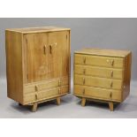 A mid-20th century walnut bedroom suite by Heals, bearing the Utility Furniture mark, comprising a