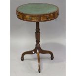 A 20th century Regency style mahogany and pollard oak revolving drum-top wine table, the leather