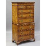 A late 20th century reproduction walnut tallboy by Brights of Nettlebed, fitted with eight drawers