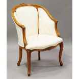 A modern Louis XV style showframe tub back chair, upholstered in patterned cream damask, height