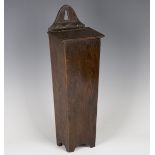 A 19th century provincial oak hanging candle box with leather hinge, height 41cm.Buyer’s Premium