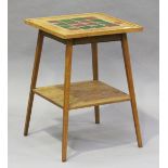 An Edwardian Arts and Crafts oak two-tier occasional table, possibly by Liberty & Co, the top