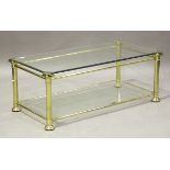 A modern gilt brass and glass rectangular coffee table with Ionic column supports, height 46cm,