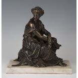 A late 19th century French brown and gilt patinated cast bronze figure of a seated Classical maiden,
