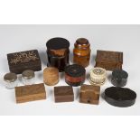 A collection of various boxes, including papier-mâché snuff boxes, turned treen vessel cases and a