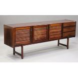 A mid-20th century rosewood dining room suite by A.H. McIntosh & Co Ltd, Kirkcaldy, Scotland,