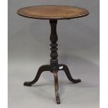 A Victorian mahogany oval wine table, on a turned baluster stem and tripod legs, height 72cm,