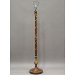 An early 20th century walnut and parcel gilt lamp standard, height 153cm.Buyer’s Premium 29.4% (