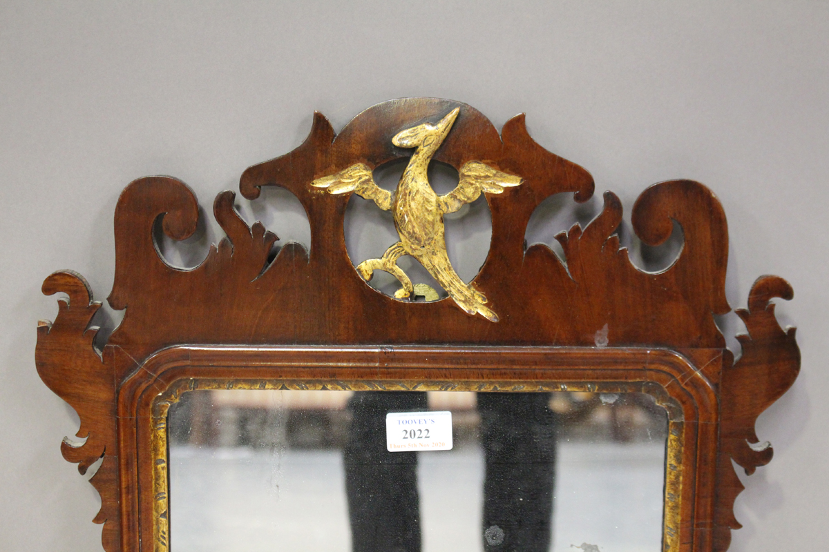 A George III mahogany fretwork framed wall mirror, the pierced top carved and gilded with a phoenix, - Image 3 of 3