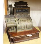 An early 20th century cast brass National cash register, the case bearing cast serial number '