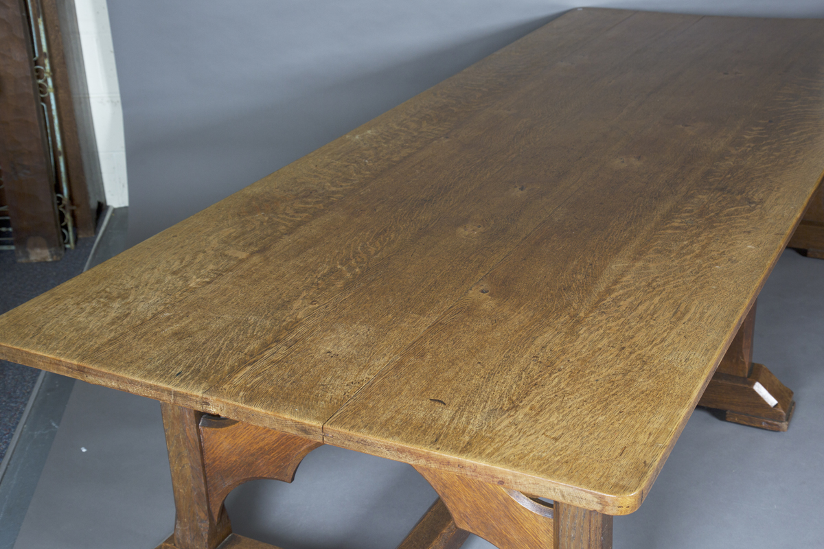 A large early 20th century Arts and Crafts oak refectory table, the rectangular top above eight - Image 3 of 4