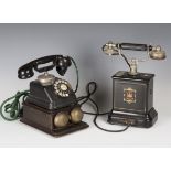 An early 20th century Belgian black enamelled telephone by Jydsk, height 32cm, width 25cm,