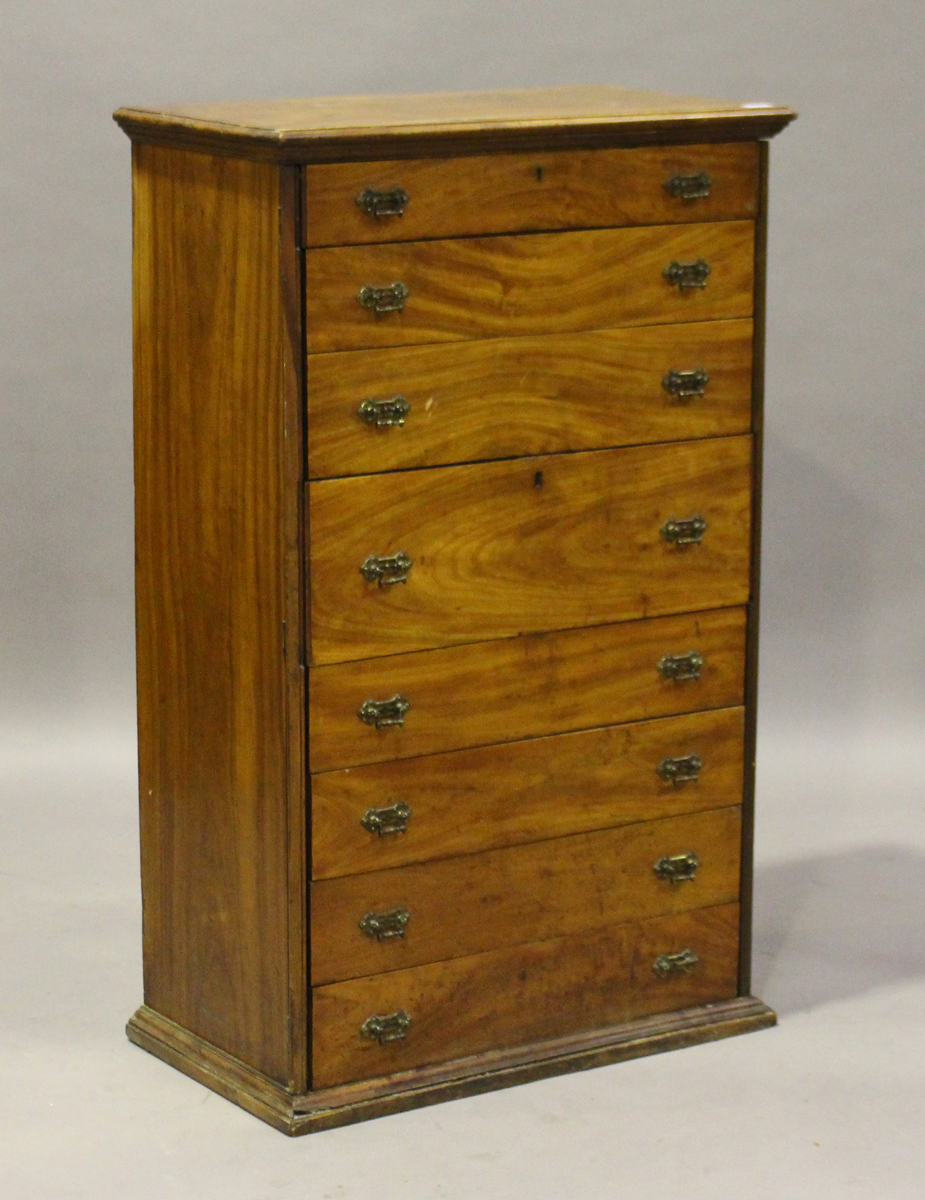 A late 19th century Colonial camphor Wellington style chest of eight drawers, fitted with locking