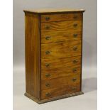 A late 19th century Colonial camphor Wellington style chest of eight drawers, fitted with locking