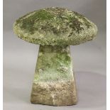 A 19th century carved staddle stone of typical mushroom form, height 67cm, diameter 57cm.Buyer’s