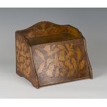 A late Victorian Arts and Crafts pokerwork stationery box, the gallery back, sloping front and sides