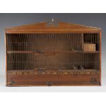 A 19th century softwood bird cage with wire panel front and chequer inlaid band, height 44cm,