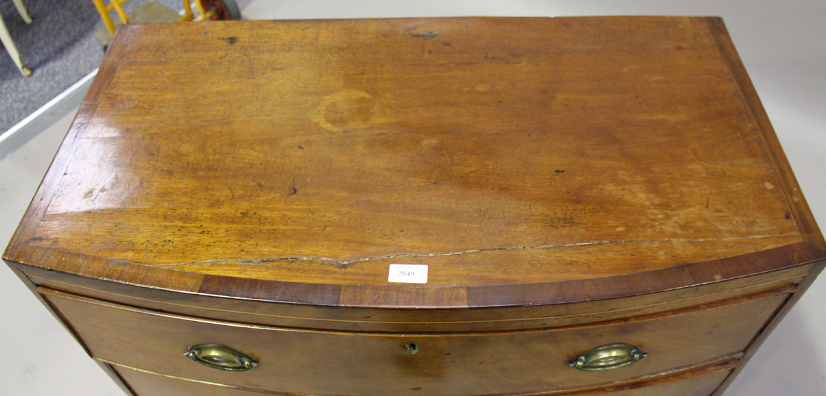 A George IV mahogany bowfront chest of three drawers, height 86cm, width 88cm, depth 46cm (some - Image 3 of 3