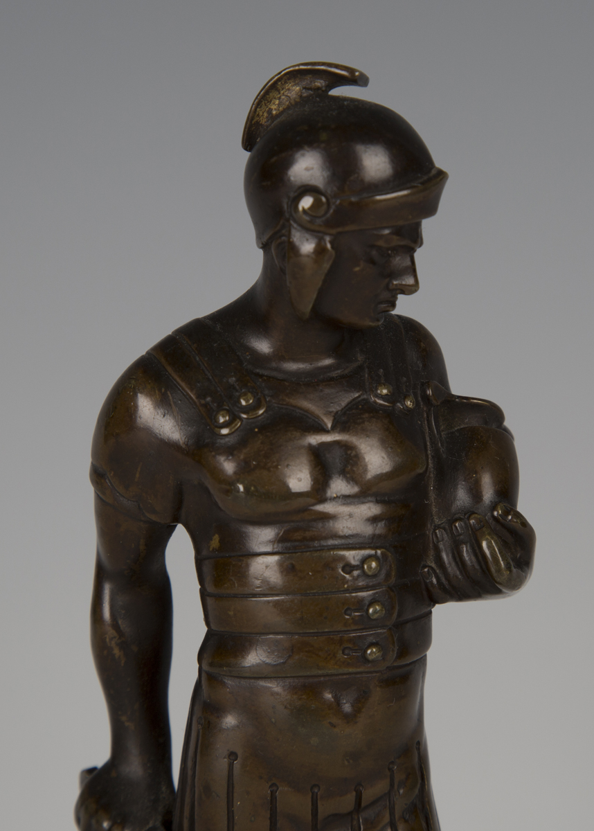 A late 19th century Continental brown patinated cast bronze figure of a Roman soldier holding a - Image 4 of 4