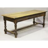 A 19th century French walnut refectory table, raised on turned and block legs, height 75cm, length
