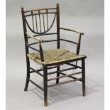 A late Victorian stained beech Sussex type armchair, possibly by Morris & Co, the unusual curved