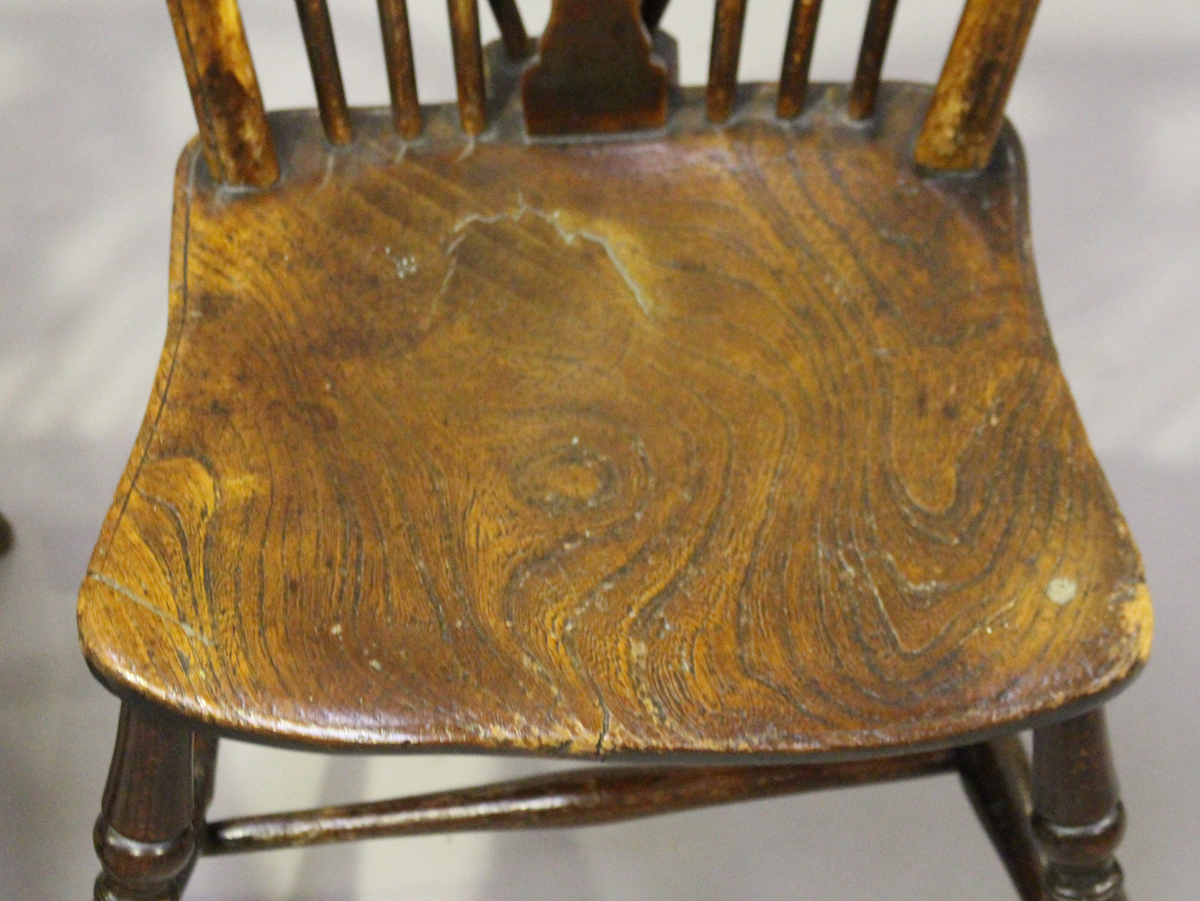 A harlequin set of four early Victorian ash and elm stick and wheel back Windsor dining chairs, - Image 8 of 9