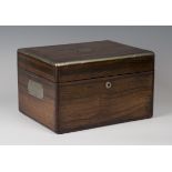 A George IV rosewood and nickel mounted travelling vanity case, the sides with recessed handles, the