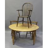 A late Victorian pine circular drop-flap kitchen table, fitted with a single drawer, height 76cm,