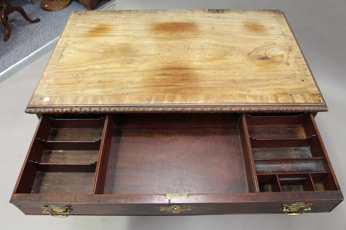 A George II mahogany kneehole desk, the crossbanded top with a carved edge above drawers and central - Image 4 of 5