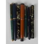 A group of fountain pens, including two Conway-Stewart pens, No. 240 and 286, two Parkers and a Swan