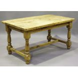 A 20th century Victorian style pine kitchen table, on turned and block legs, height 77.5cm, length
