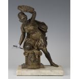 A late 19th century Continental gilt cast bronze figure of a Classical female warrior, holding a