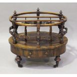 An unusual late Victorian rosewood oval Canterbury, the three divisions within a pierced fretwork