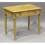 A Victorian stripped pine side table, fitted with a single drawer, on turned legs, height 64cm,