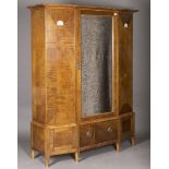 An Edwardian Arts and Crafts Glasgow School satin walnut wardrobe by Wylie & Lochhead, the angular