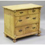 A 20th century Continental stripped pine chest of two short and two long drawers, on bun feet,