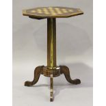 A Regency rosewood octagonal games table, the crossbanded top inlaid with a maple and rosewood