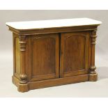 A late Victorian mahogany marble-topped side cabinet, fitted with two arched panel doors flanked