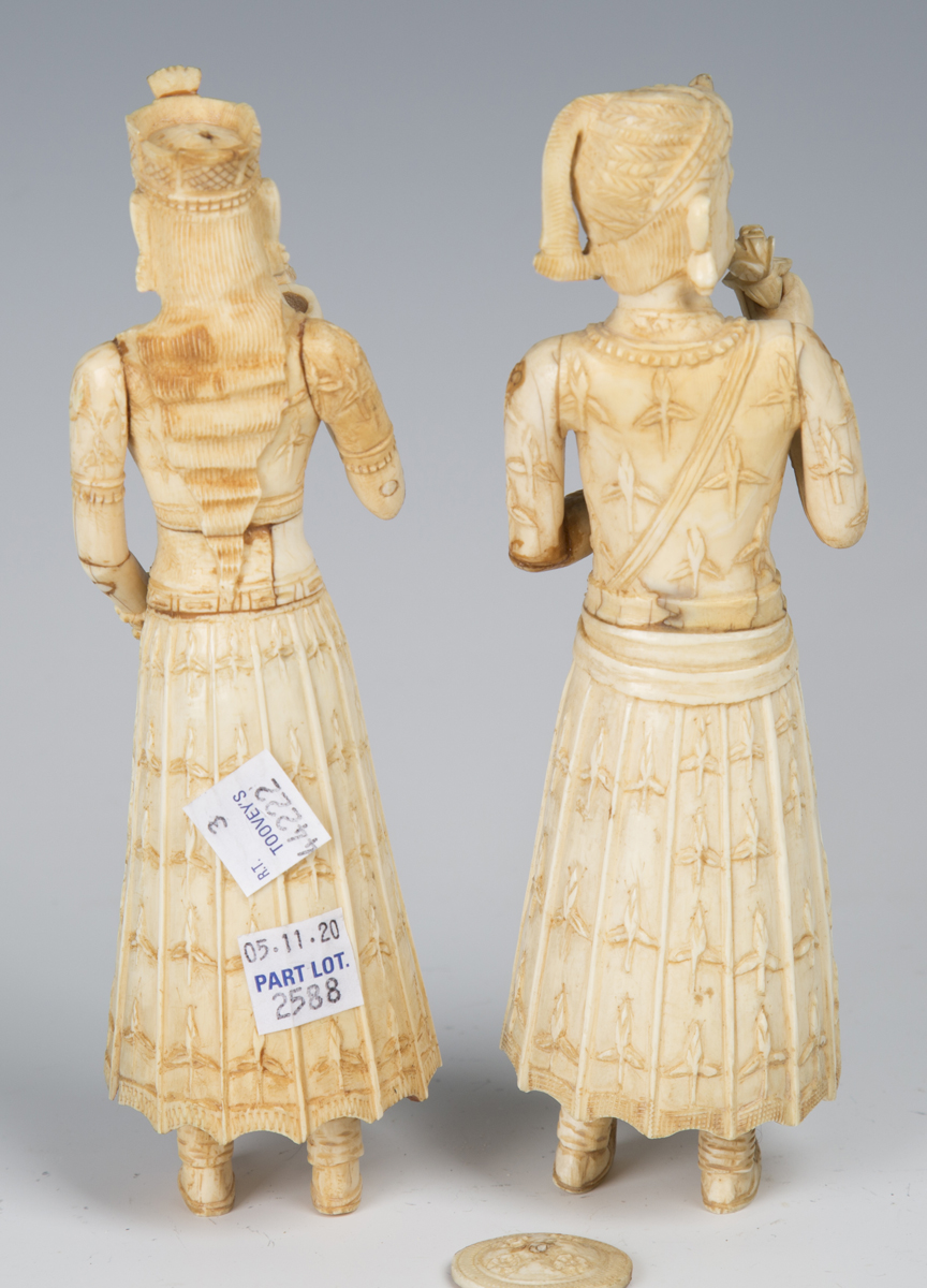 A pair of 19th century Indian carved ivory full-length figures of a lady and gentleman, height 18cm, - Image 5 of 7