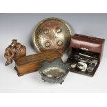 A selection of collectors' items, including an early 20th century leather cased vanity set, a