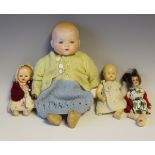 An Armand Marseille bisque head Dream Baby doll with painted moulded hair, sleeping blue eyes and