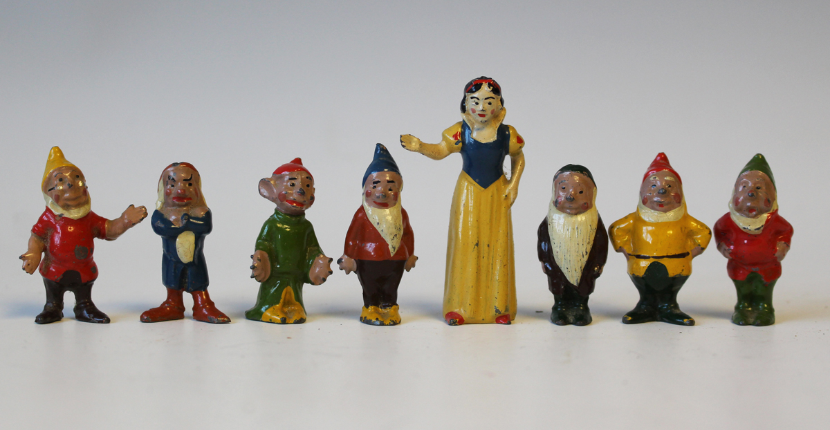 A Britains painted lead figure set No. 1654 Snow White and the Seven Dwarfs (paint chips), and a