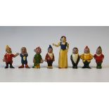 A Britains painted lead figure set No. 1654 Snow White and the Seven Dwarfs (paint chips), and a