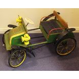 A 1960s Tri-ang treadle-drive pressed steel child's pedal car in the style of a De Dion Bouton