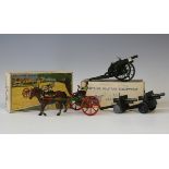 A Britains Farm No. 8F horse rake and a Britains Military Equipment No. 1201 Royal Artillery gun,