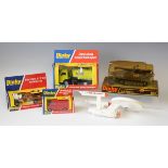 Four Dinky Toys vehicles, comprising a No. 226 Ferrari 312/82 racing car, a No. 410 Bedford Royal