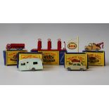 Four Moko Lesney Matchbox vehicles, comprising a No. 11A ERF road tanker, finished in red with