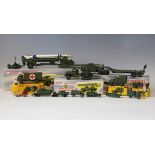 A small collection of Dinky Toys and Supertoys army vehicles, comprising a No. 660 tank transporter,