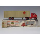 A Dinky Supertoys No. 948 tractor and trailer 'McLean', with red plastic hubs, boxed (some paint