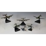 A small collection of modern diecast model aircraft, including a B29 Super Fortress 'Enola Gay', a